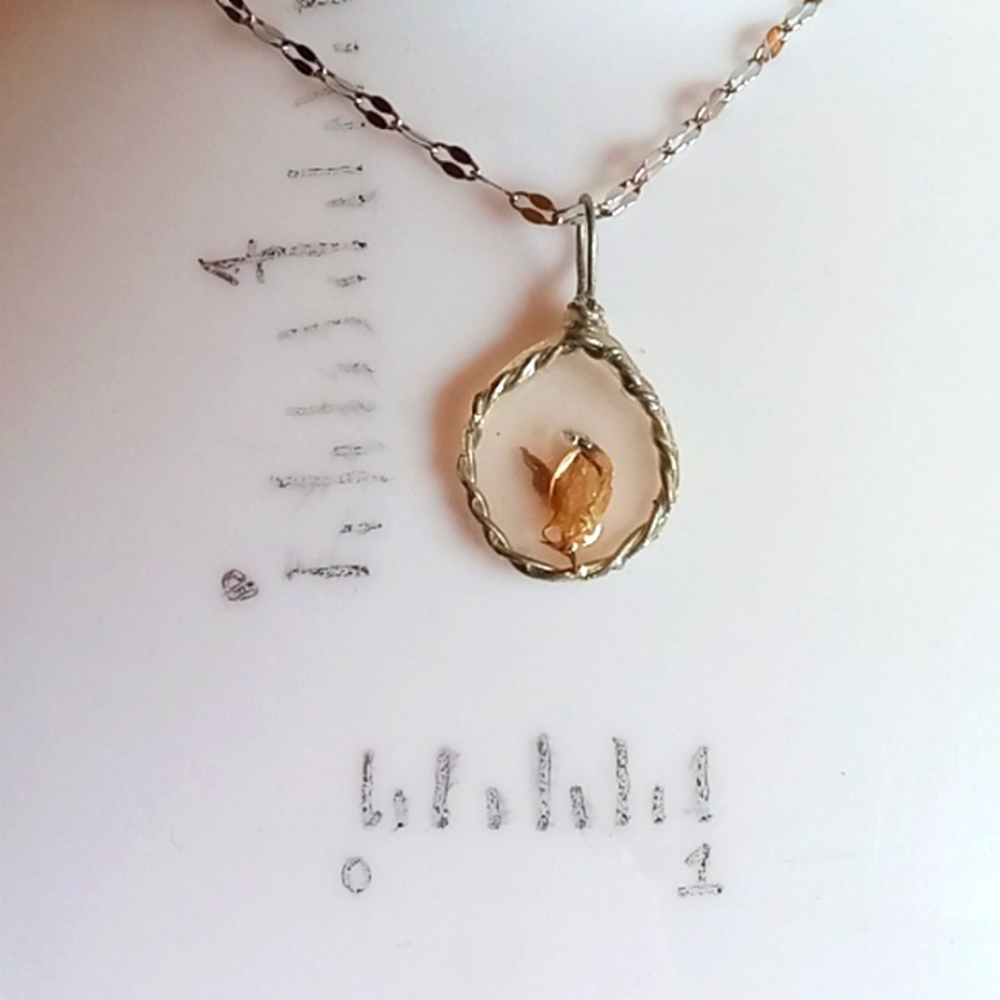 Floral necklace, amulet